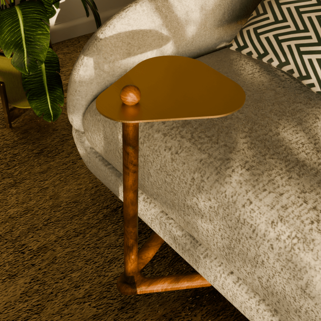 Trilo side table next to a modern sofa, showcasing solid teak wood and sculptural design