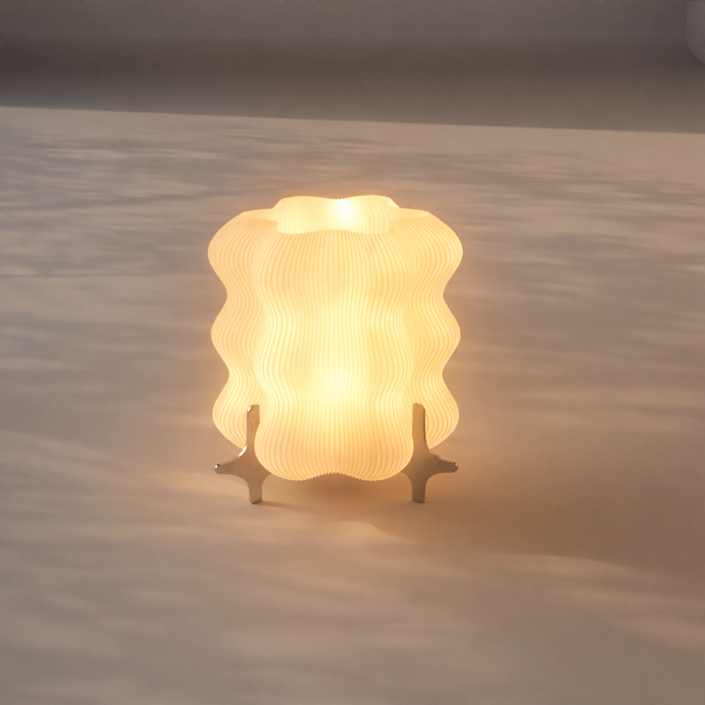 Designer AURA table lamp by Nata Lia with warm diffused glow