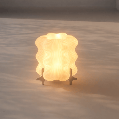 Designer AURA table lamp by Nata Lia with warm diffused glow