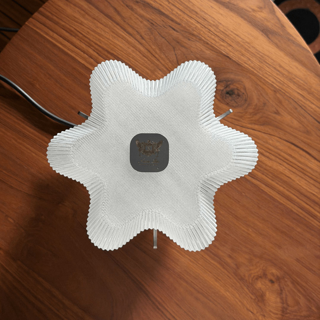 Sculptural surface detail of AURA minimalist table lamp